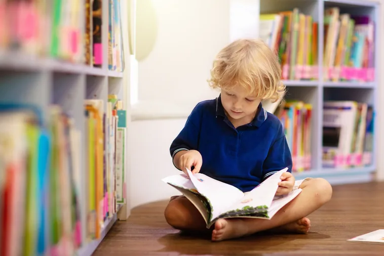 Child in school library
